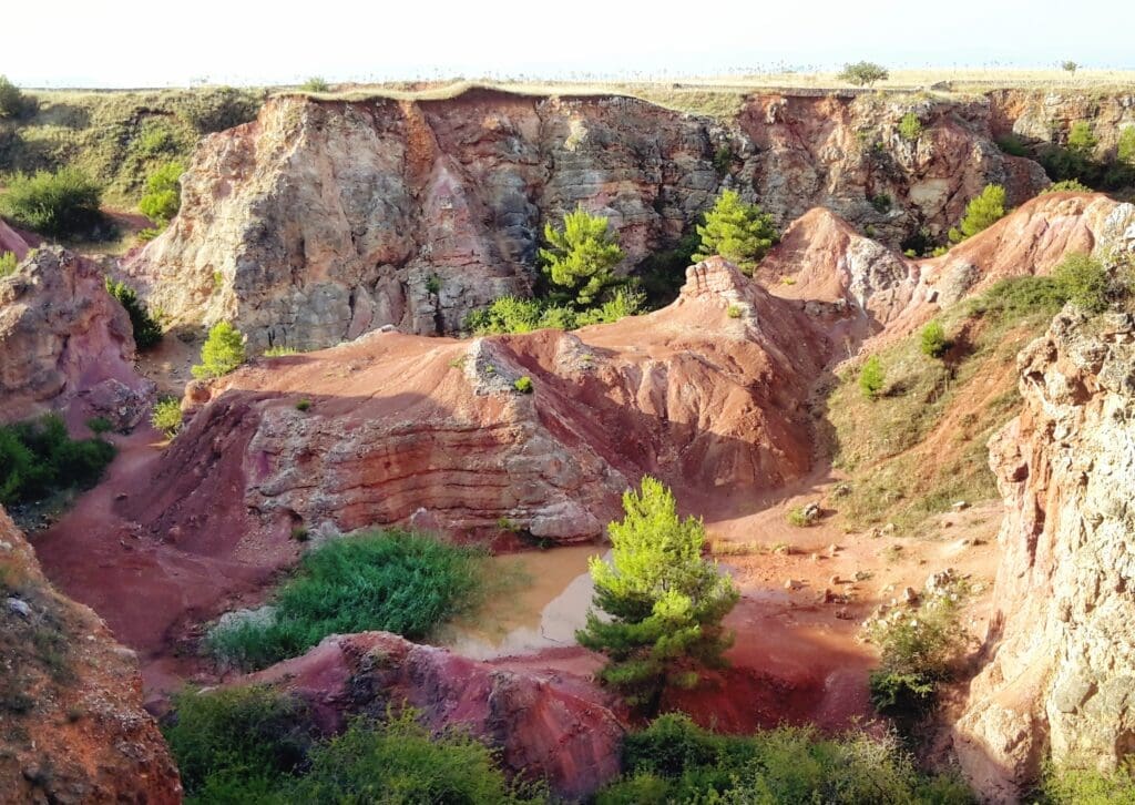 Former bauxite quarry in Italy; bauxite particles are optimal for storing solar (heat) energy