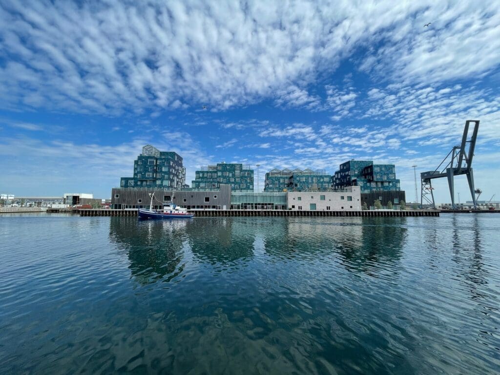 Copenhagen International School with 12,000 teal colored solar panels, integrated into its facade