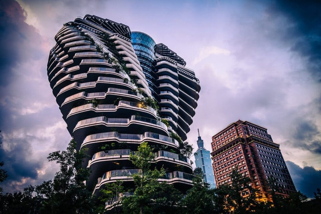 Agora Garden Tower in Taipei, Taiwan, has a spiral architecture to allow spacious balconies for lush greenery and edible plants