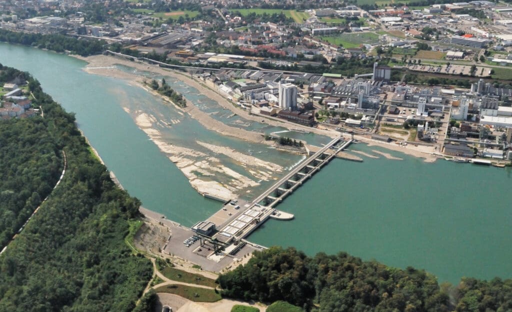 Aerial view of a big Swiss hydroelectric power plant across the river Rhine