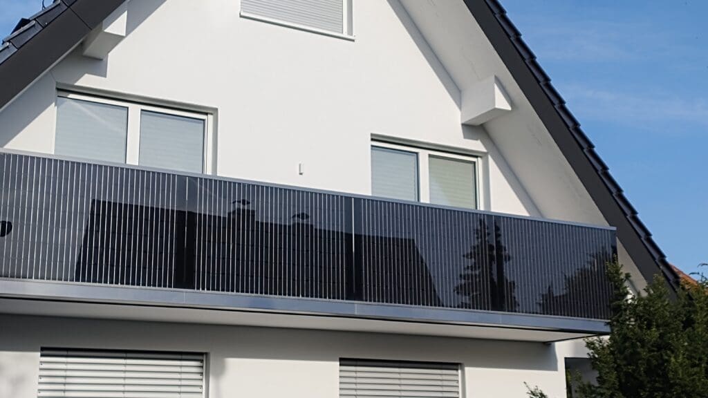 Balcony solar power on a detached house, very nicely integrated into the balcony railing