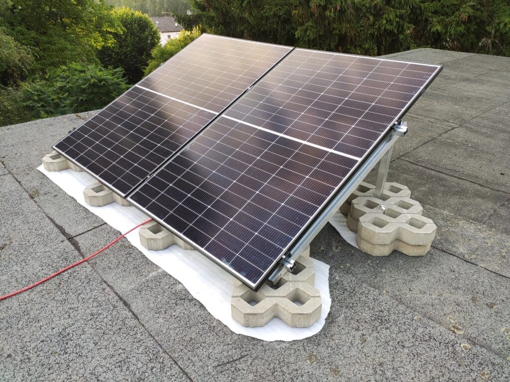 Balcony power plant on a grey flat roof