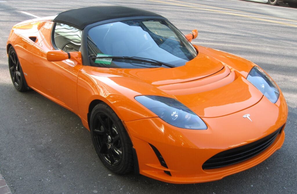 Bright orange Tesla Roadster EV