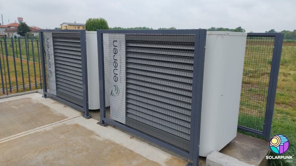 Two residential heat pump units next to each other